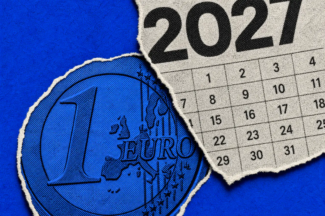 Calendrier 2027 refermé sur une pièce d’euro